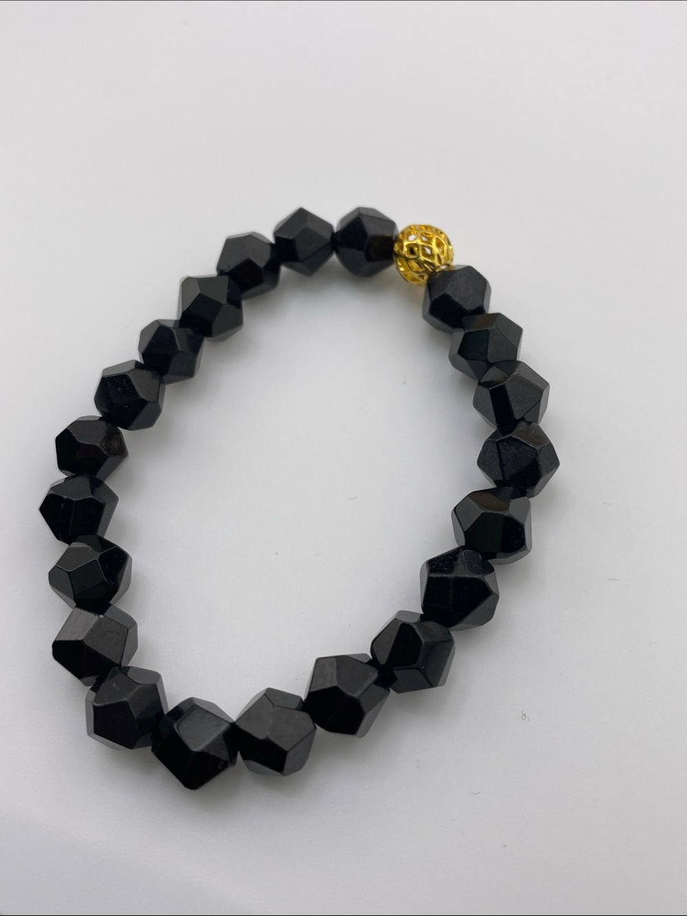 Black Faceted Bead Stretch Bracelet with Gold Accent